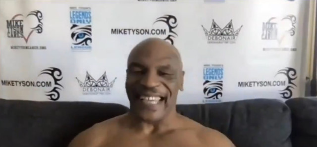 , Watch Mike Tyson rip off shirt to show ripped physique as he interrupts interview with NFL quarterback Russell Wilson