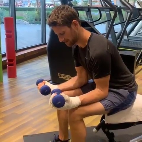 , Watch brave Romain Grosjean hit the weights just SIX DAYS after crash which left him in hospital with burns to his hands