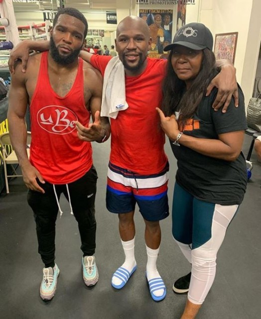 Denis Douglin pictured with Mayweather after sparring 
