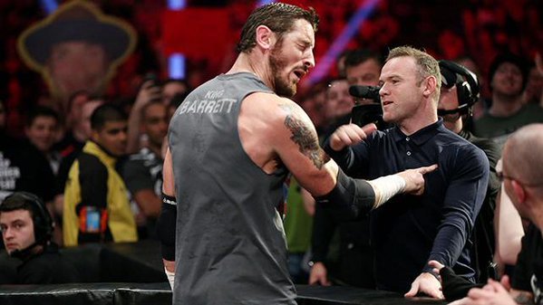 Wayne Rooney slapping Wade Barrett during a 2016 WWE appearance 