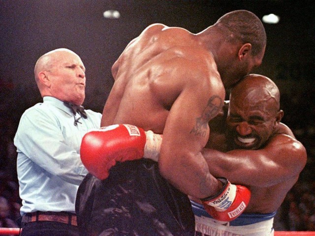 , Evander Holyfield reveals he is in talks with Mike Tyson about £150m trilogy fight and insists: I’m ready for him