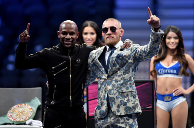 , Mayweather shows off diamond jewels and watch and boasts ‘I didn’t retire from making money’ ahead of Logan Paul fight