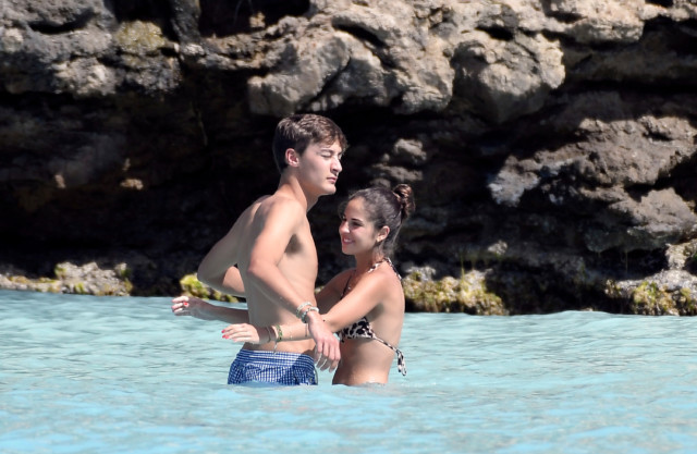 , F1 star George Russell cuddles and kisses stunning girlfriend Carmen Montero Mundt on beach in St Barts