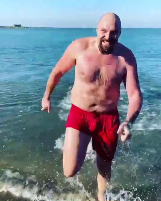 , Watch Tyson Fury strip down and dive into sea in Morecambe on bitter 3C day as he trains for Anthony Joshua fight