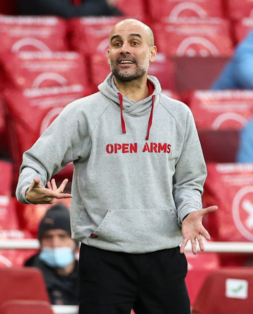 Pep Guardiola showed off his charitable jumper at the Emirates