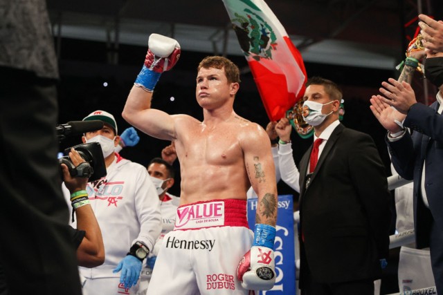 , Watch Canelo Alvarez kick two Jake Paul fans out of ring in ‘X-rated’ blast after they gatecrash his celebrations