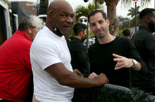 , Mike Tyson smokes dodgy-looking cigarette ahead of massive Super Bowl tropical pool party in Tampa