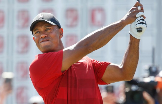 , When did Tiger Woods get back surgery and why?