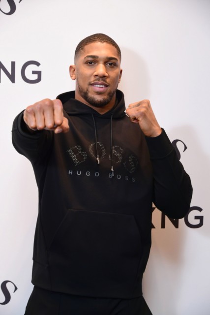 , Anthony Joshua models Hugo Boss clothing after telling Tyson Fury HE is in charge of undisputed title fight