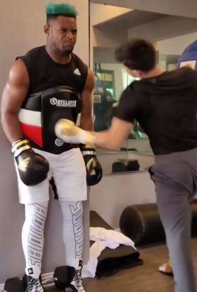 , Watch Ryan Garcia deliver brutal body shots to NFL ace JuJu Smith-Schuster in latest craze sending him tumbling in agony