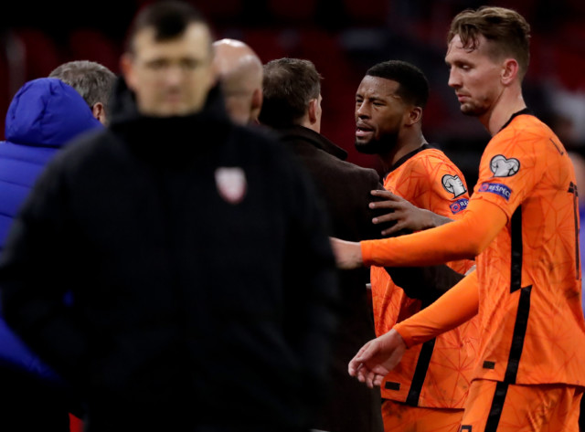 , Liverpool star Wijnaldum involved in heated touchline row with Holland boss De Boer after being hauled off vs Latvia