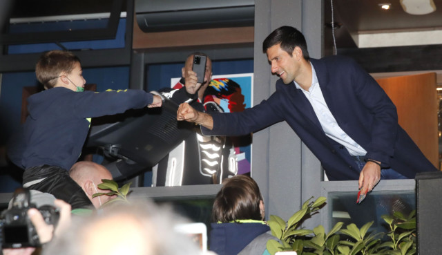 , Djokovic flouts lockdown rules AGAIN as he parties with hundreds of fans in Belgrade after beating Federer record
