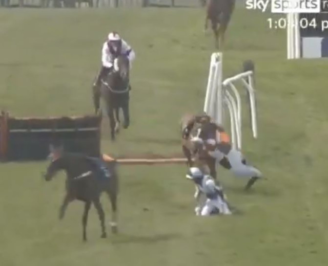 , Watch terrifying moment champion jockey Brian Hughes is barged over by loose horse during carnage at Sedgefield