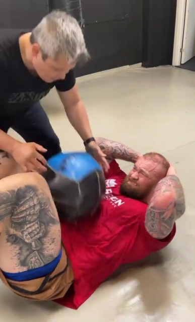 , Watch as Game of Thrones star Hafthor Bjornsson has exercise ball thrown at body to toughen up for Eddie Hall fight