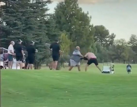 , Watch as wild brawl breaks out on golf course as one shirtless man attacks another with flagstick in charity fundraiser