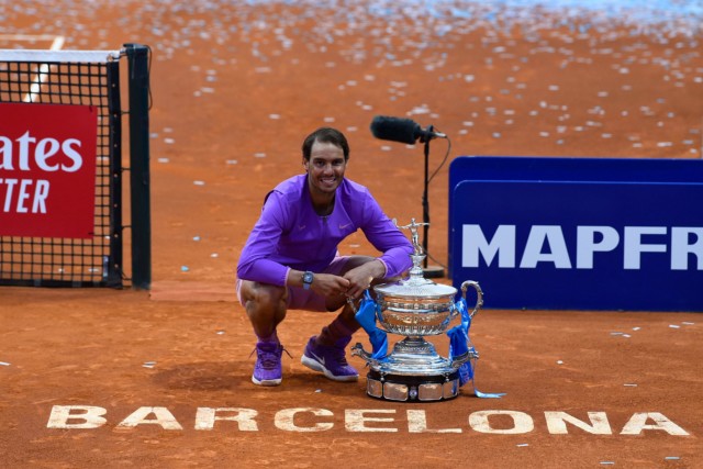 , Rafa Nadal dives into SWIMMING POOL to celebrate incredible 12th triumph in Barcelona Open