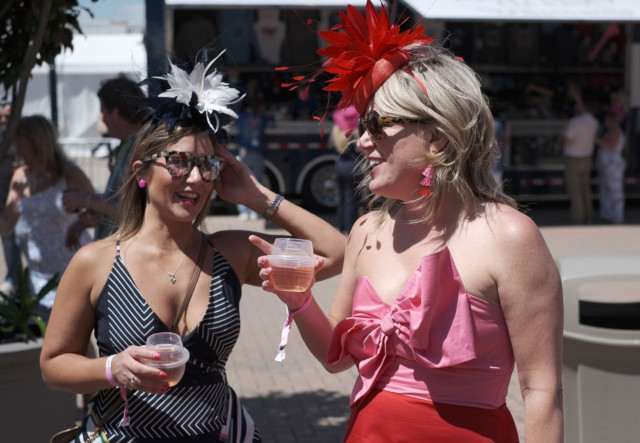 , ‘Raucous’ Kentucky Derby crowd of 50,000 to be biggest in US since Covid began as punters file into Churchill Downs