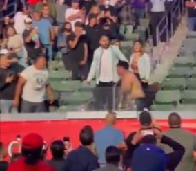 , Watch mass fan brawl break out while Andy Ruiz Jr fights Chris Arreola as punches rain down in stands and ring