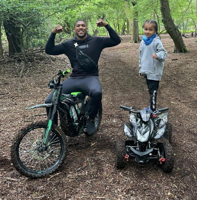 , Anthony Joshua shares rare photo with young son JJ, 5, out quad biking with £500m Tyson Fury fight still in balance
