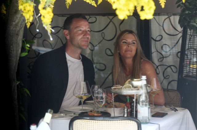 , Chelsea legend John Terry shares kiss with wife Toni as pair celebrate wedding anniversary with intimate date