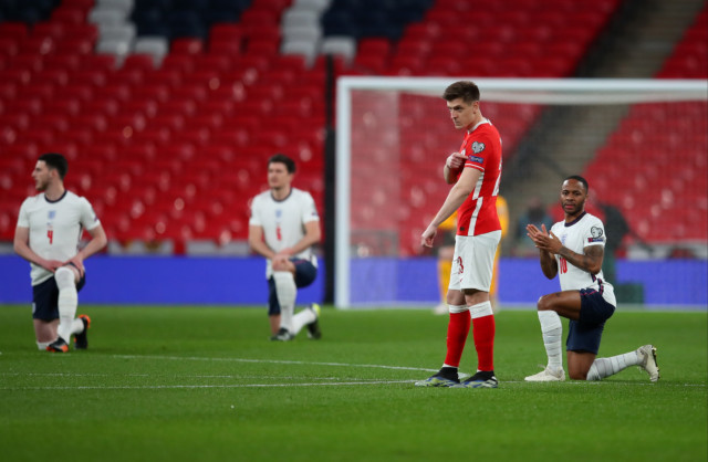 , Why do some England fans boo taking the knee?