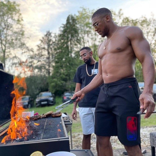 , Anthony Joshua shows off hulking body at barbecue as he prepares for Oleksandr Usyk after Tyson Fury fight collapses