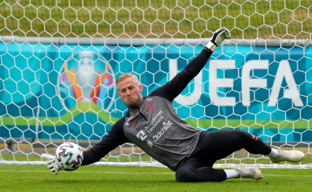 , Schmeichel says it was ‘damn nice’ to see Christian Eriksen ‘laugh and be himself’ in hospital after cardiac arrest