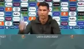 , Watch Cristiano Ronaldo remove Coke bottles at Portugal press conference and shout ‘drink water’