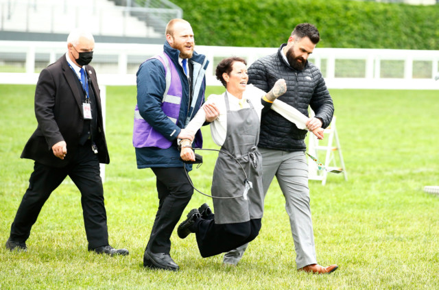 , Royal Ascot panic as Extinction Rebellion protestors chain themselves to rail in front of Queen before being ejected