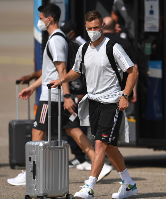 , Cheeky schoolkids BOO Germany team as they arrive at London hotel for England Euro 2020 showdown