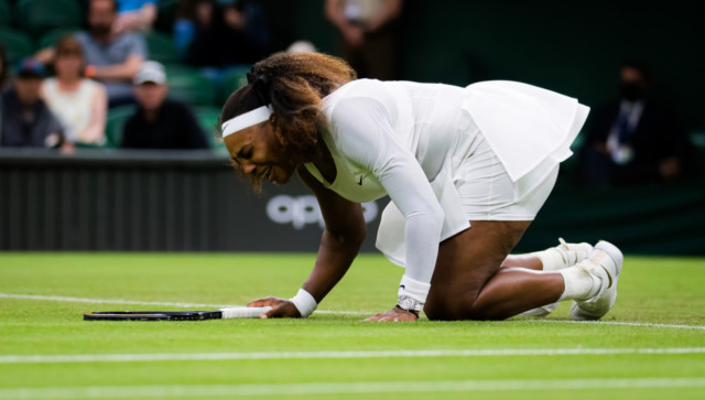 , Wimbledon ball kid stretchered off court after slipping and screaming in agony while holding leg leaving players shocked