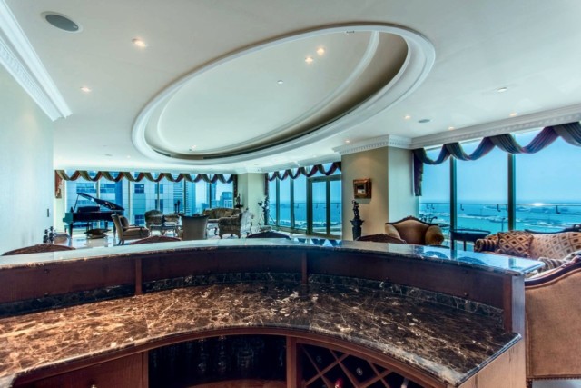 Views of the ocean surround the luxury penthouse