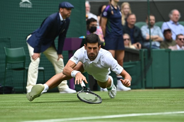 , Why are tennis players falling over at Wimbledon?