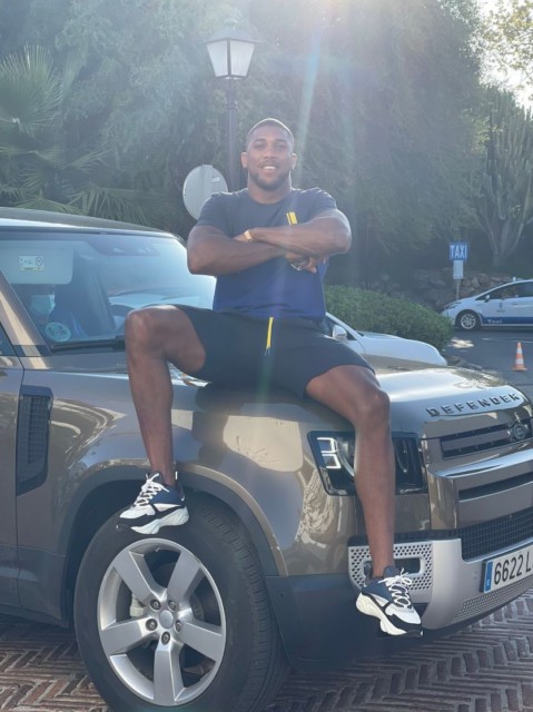 , Anthony Joshua poses on Range Rover after driving to watch pub for England’s Euro 2020 showdown with Ukraine