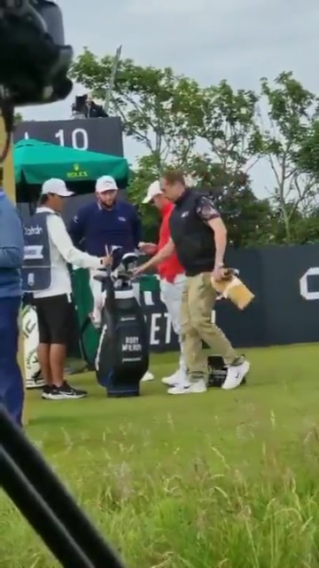 , Watch bizarre moment brazen fan takes Rory McIlroy’s club in front of ace before Scottish Open security haul him away