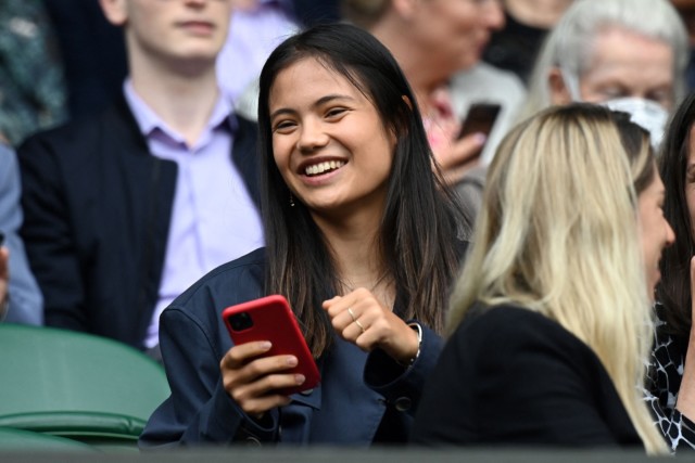 , Smiling Emma Raducanu back at Wimbledon for first time since ‘breathing problems’ forced retirement and gives thumbs up