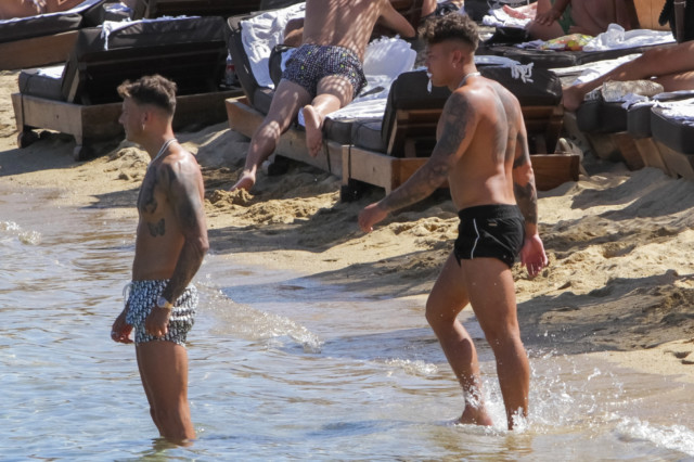 , England heroes Kalvin Phillips and Ben White mess around in sea while enjoying well-earned holiday away in Mykonos