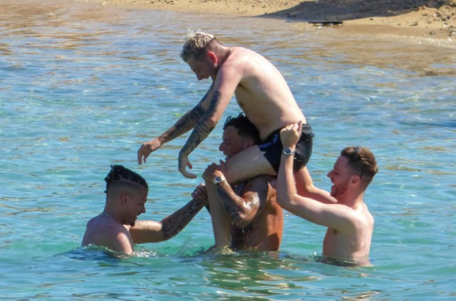 , England heroes Kalvin Phillips and Ben White mess around in sea while enjoying well-earned holiday away in Mykonos