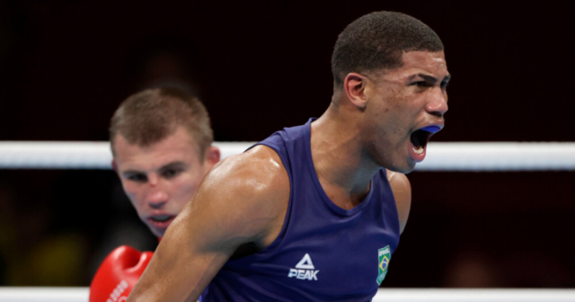 , Brazilian Hebert Sousa comes from behind to win Olympic gold with dramatic KO of Oleksandr Khyzhniak in final minutes