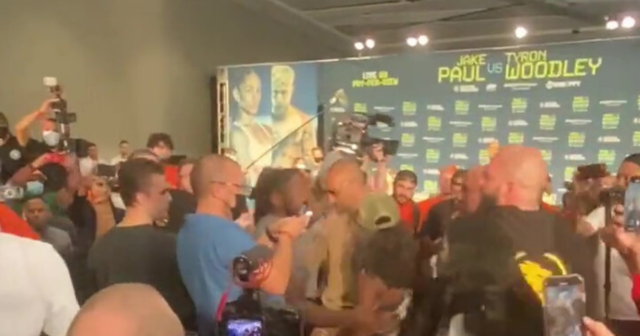 , Watch ‘hell break loose’ in melee at Jake Paul &amp; Tyron Woodley face-off as YouTuber’s team argue with UFC icon’s mother