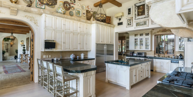 The kitchen has a rustic feel similar to what you would see in a farmhouse