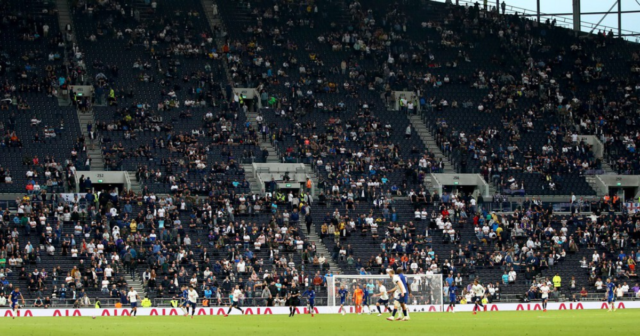 , Gary Neville brutally trolls Spurs fans &amp; says ‘The Wall has got some bricks missing’ as supporters head for early exit