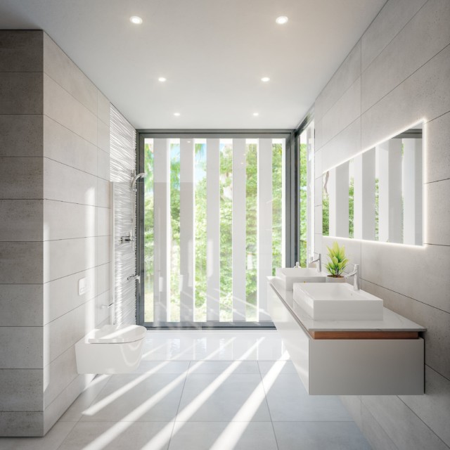A delux wetroom opens up to the garden without compromising on privacy