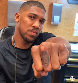 , Anthony Joshua’s tattoos include nod to his Olympic gold, African roots… and gangster films