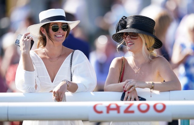 , Glam lady racegoers make the most of the heatwave as they arrive at Doncaster races in ultimate style for Leger festival