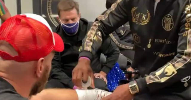 , Watch Tyson Fury joke Deontay Wilder’s coach ‘missed the knuckle-dusters last time’ as he watches hands being wrapped
