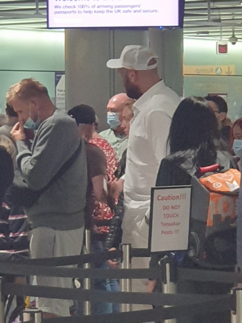 , Tyson Fury and Paris look exhausted on UK return after wild parties but people’s champ still queues at passport control