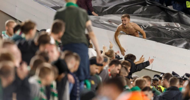 , Police make three arrests after emergency worker assaulted during shocking clash between West Ham and Rapid Vienna fans