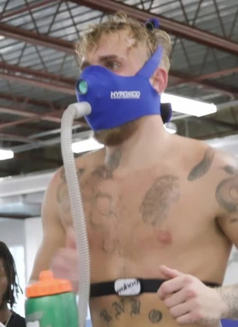 , Watch topless Jake Paul run in special altitude training mask as he responds to Tommy and Tyson Fury’s training video