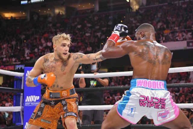 , Jake Paul vows to ’embarrass’ Tommy Fury’s entire family including Tyson as he shows off gruelling neck exercise